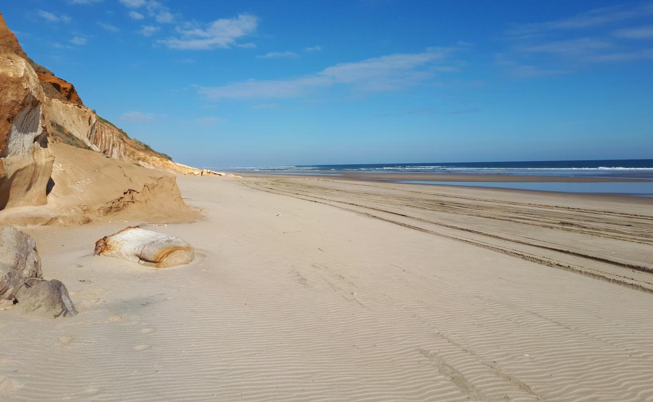 Photo of Omamari Beach with bright fine sand surface