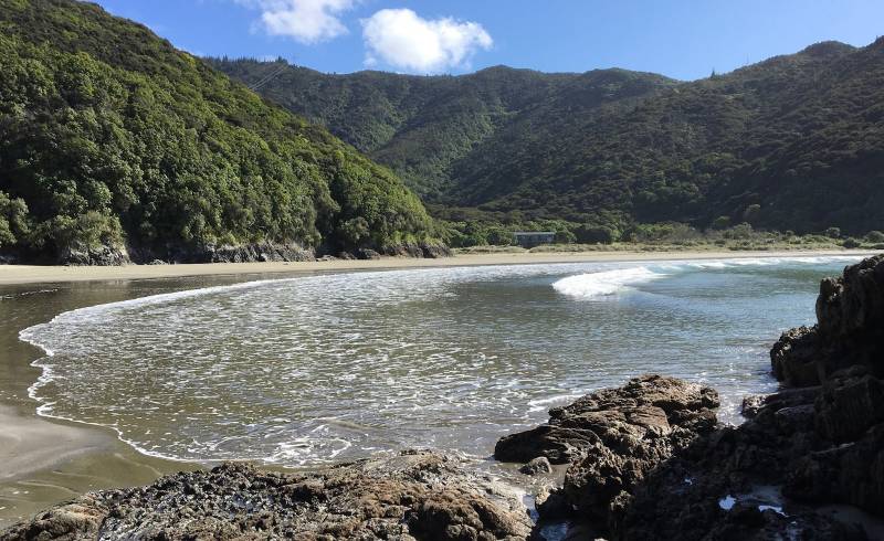 Photo of Whites Bay with bright sand surface