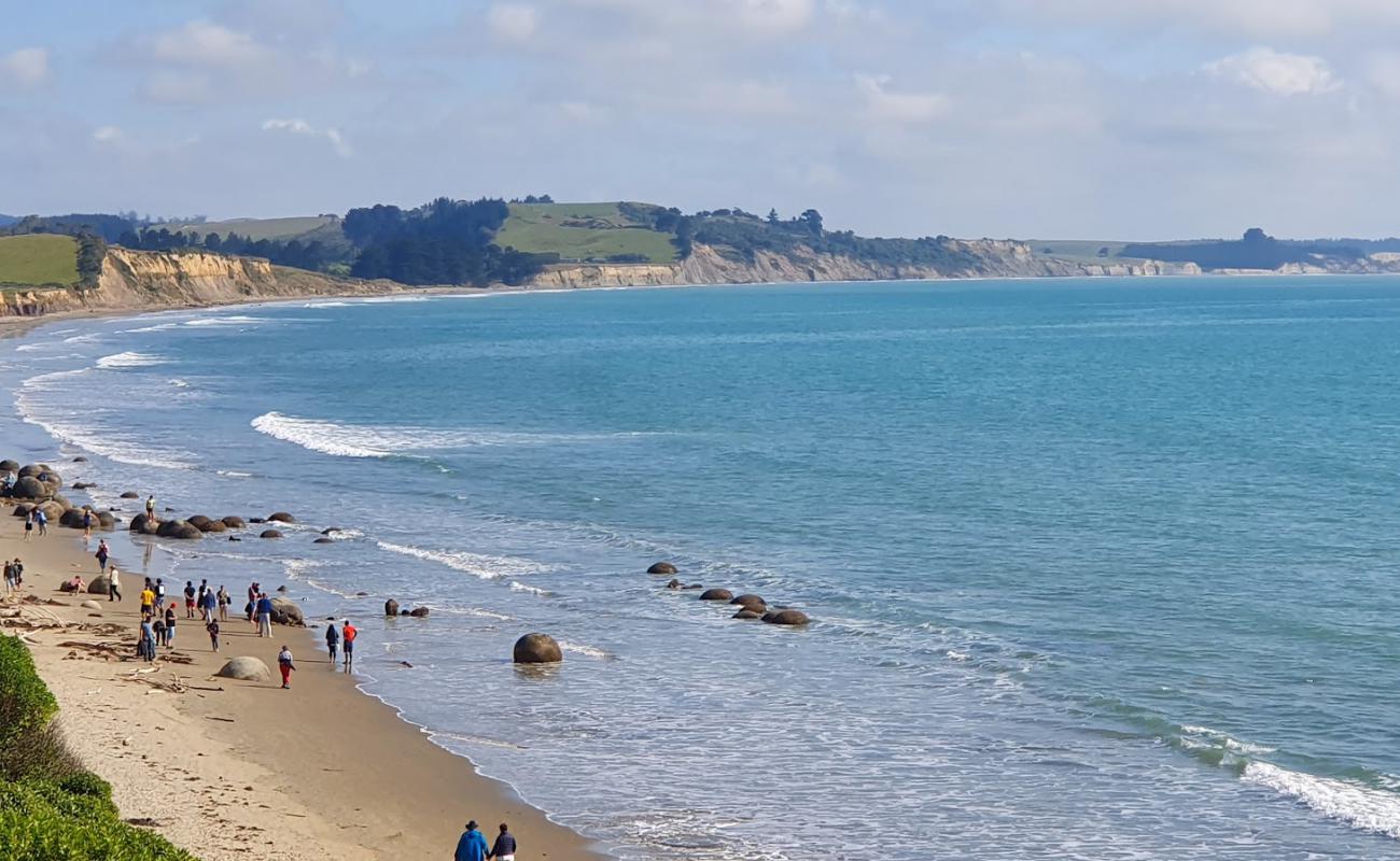 Photo of Moeraki Boulders Beach with bright sand surface