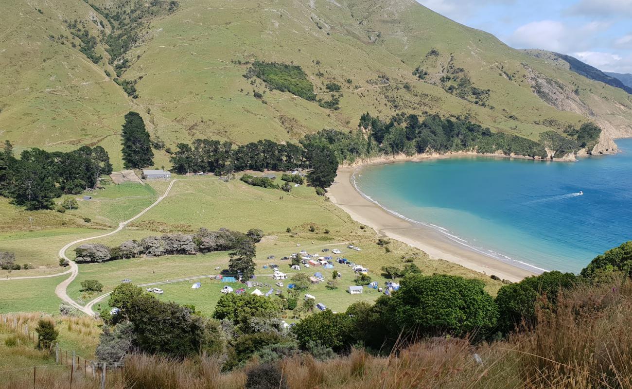 Photo of Titirangi Beach with bright sand surface