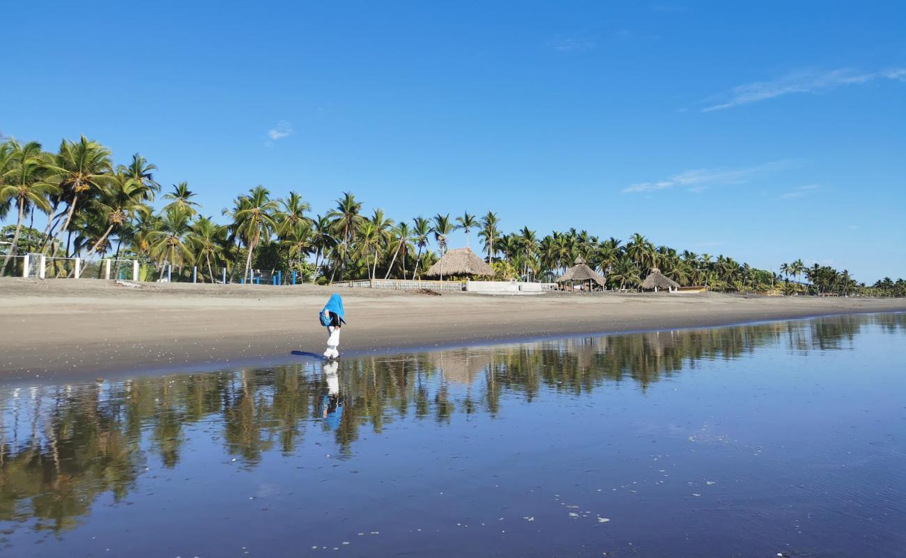 Photo of Poneloya beach with gray sand surface