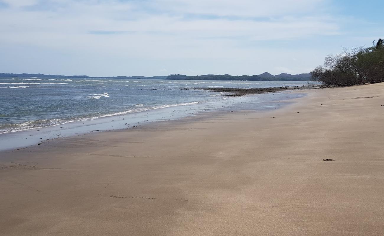 Photo of Playa Nanzal with black sand & pebble surface