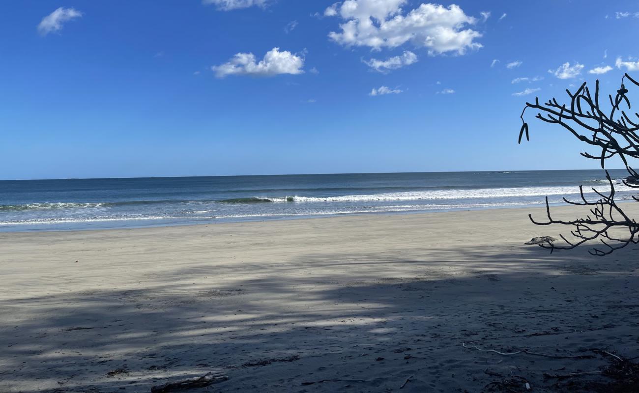 Photo of Madronito Beach with brown sand surface