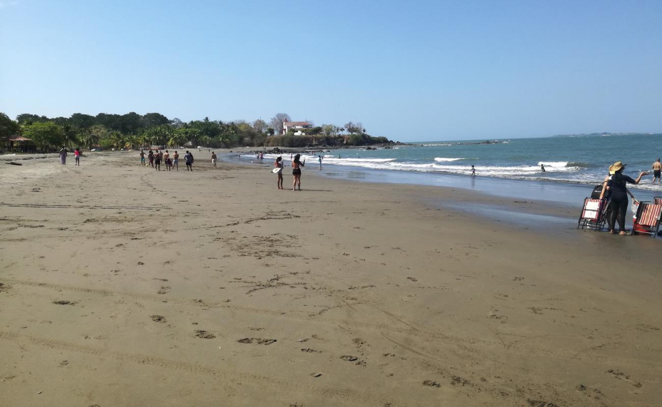 Photo of Rincon Beach with brown sand surface