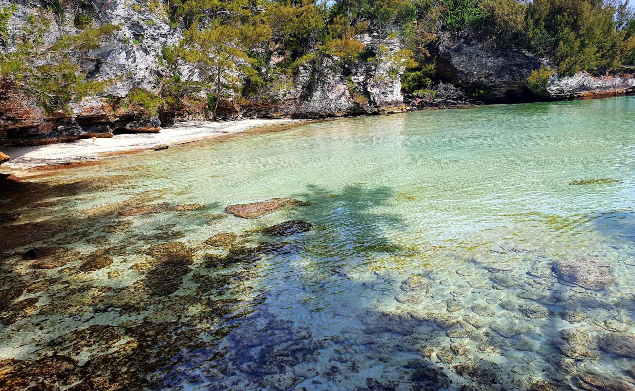 Photo of Deep Bay Beach with bright sand & rocks surface