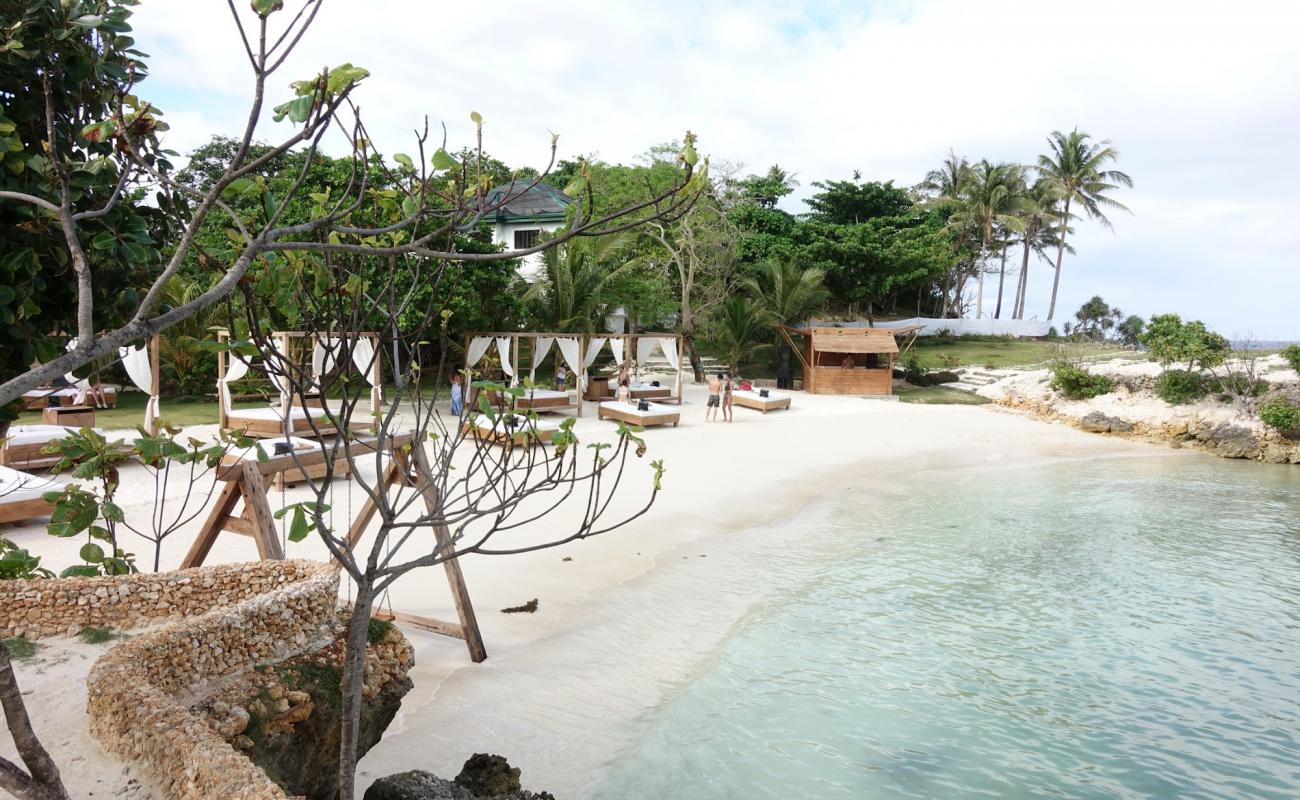 Photo of Kama Beach Club with bright fine sand surface