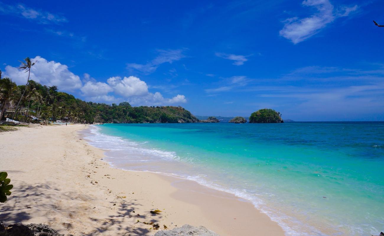 Photo of Iligan Beach with bright fine sand surface