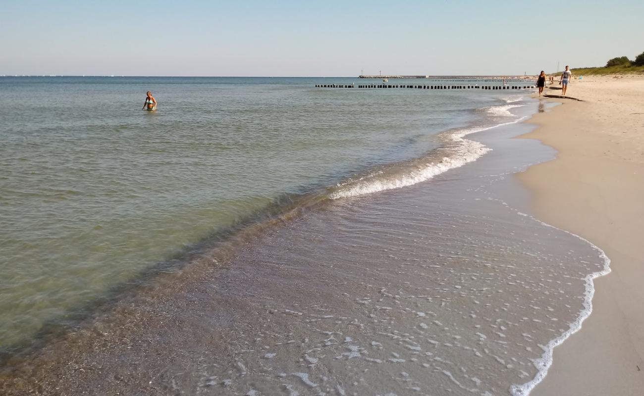 Photo of Dziwnow Beach with bright sand surface