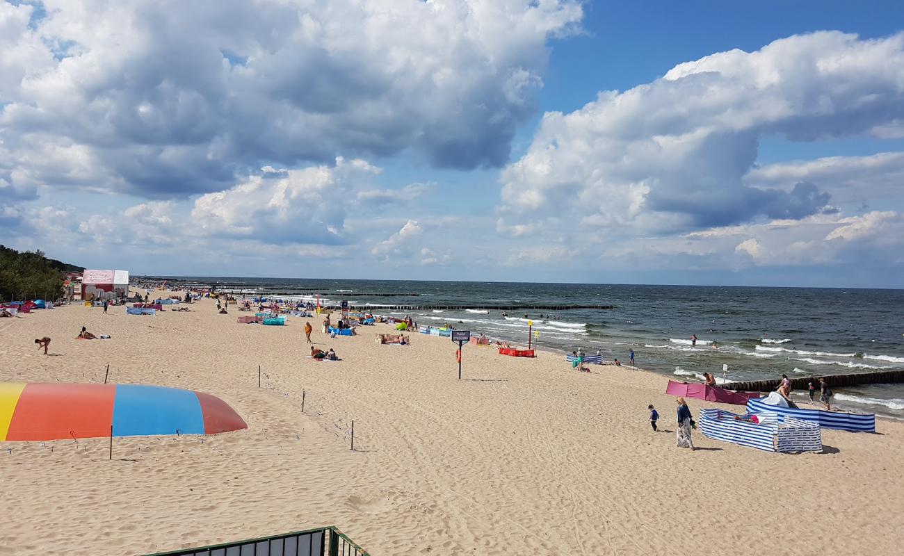 Photo of Plaza w Dziwnowku with bright fine sand surface