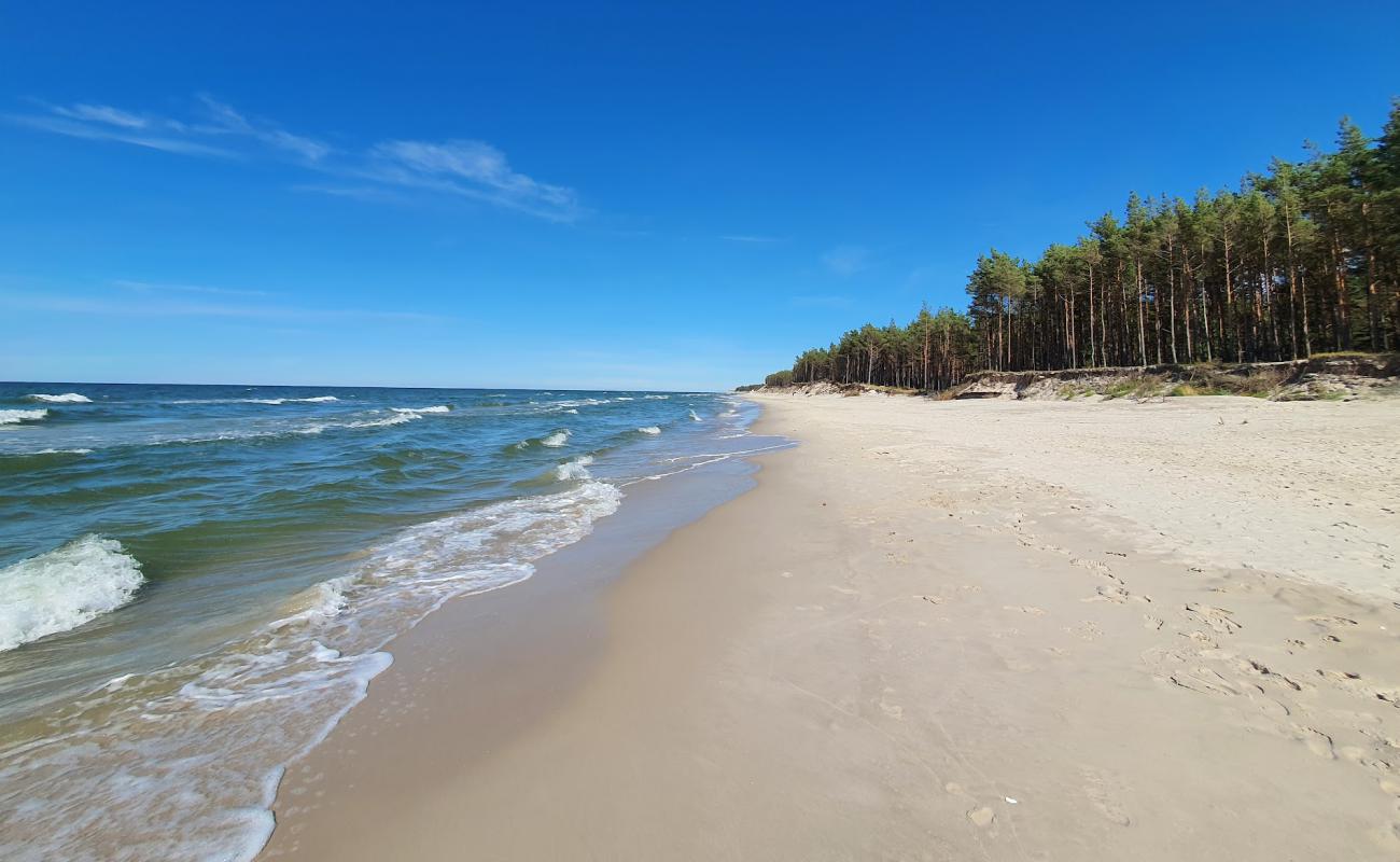 Photo of Ulinia Beach with white fine sand surface