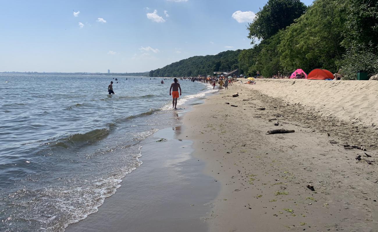 Photo of Kolibki Beach with bright fine sand surface