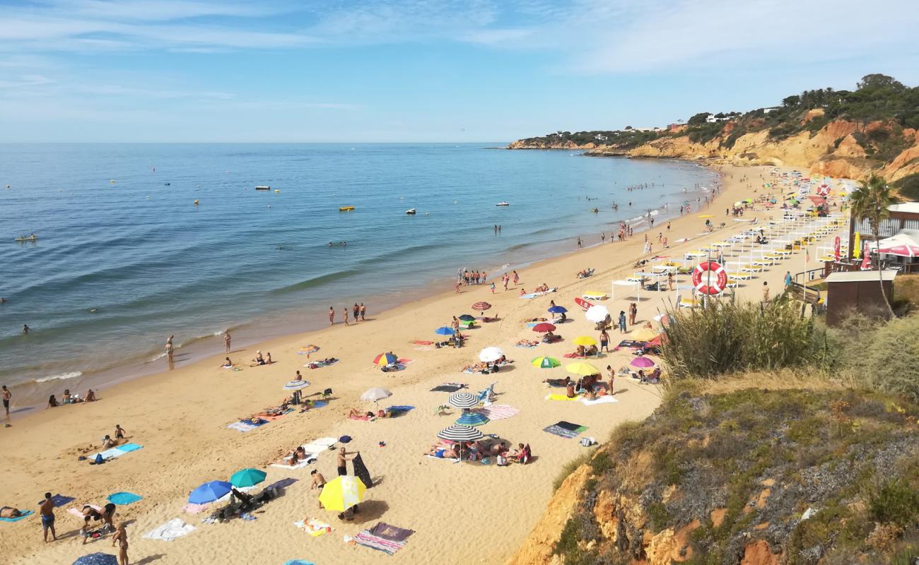 Photo of Praia Maria Luisa with brown fine sand surface