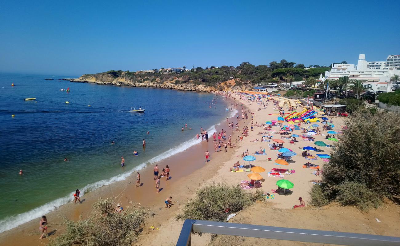 Photo of Praia da Oura with brown fine sand surface