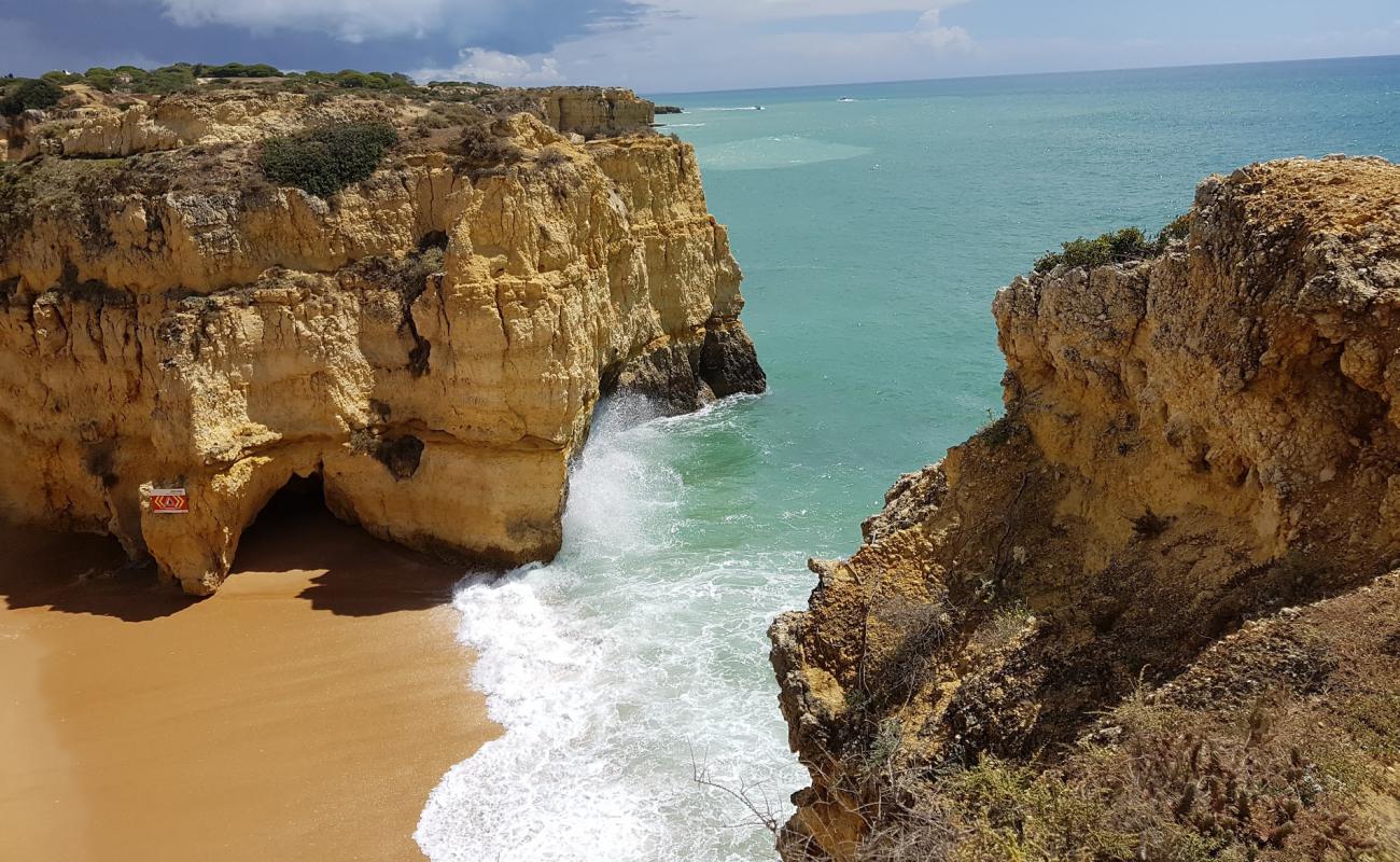 Photo of Praia da Fraternidade with bright sand surface