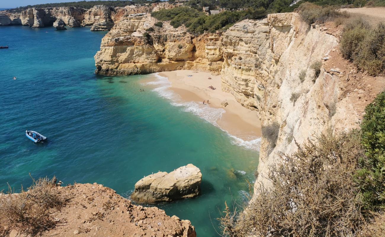 Photo of Praia do Pau with brown fine sand surface