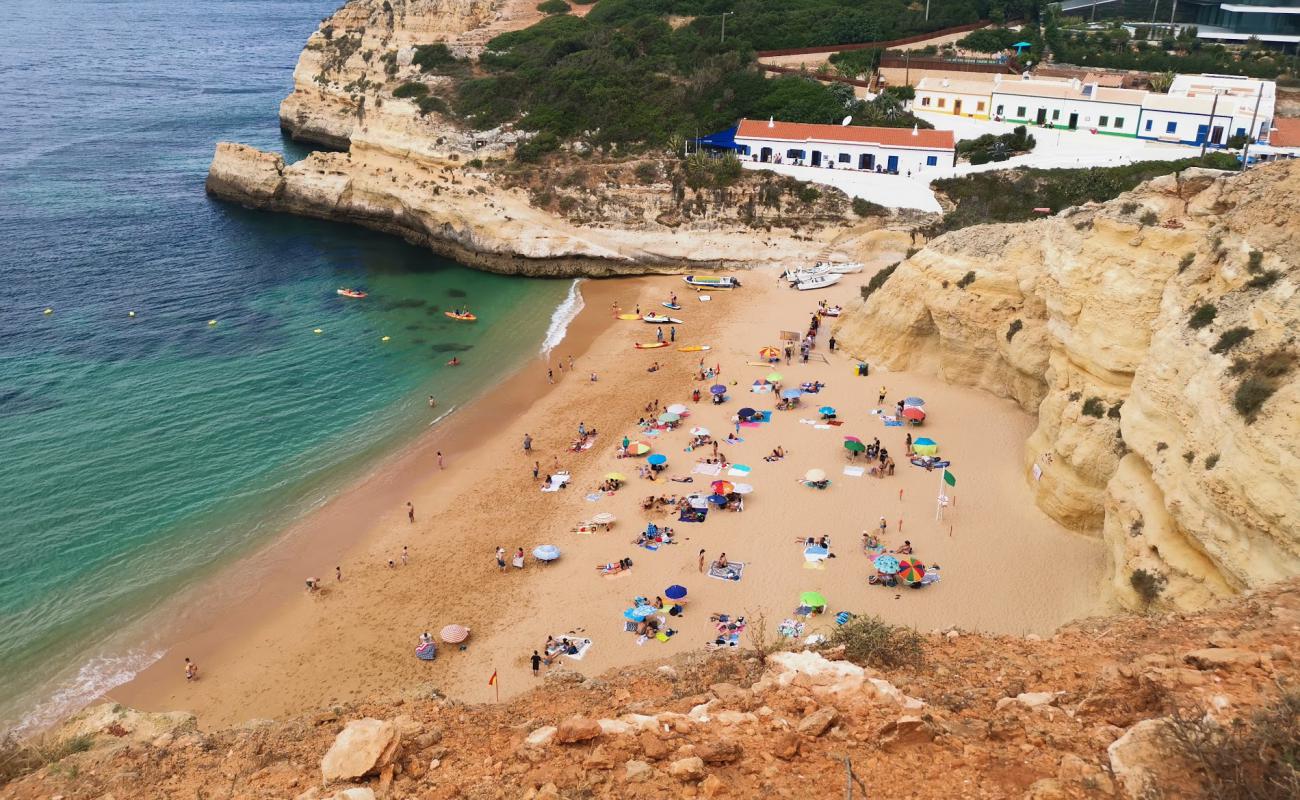 Photo of Benagil Beach with brown fine sand surface