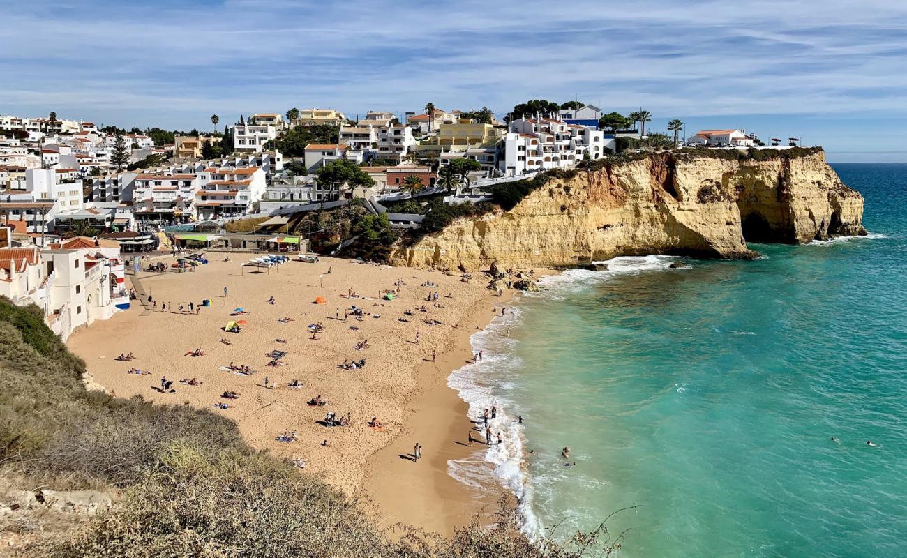 Photo of Praia de Carvoeiro with bright sand surface