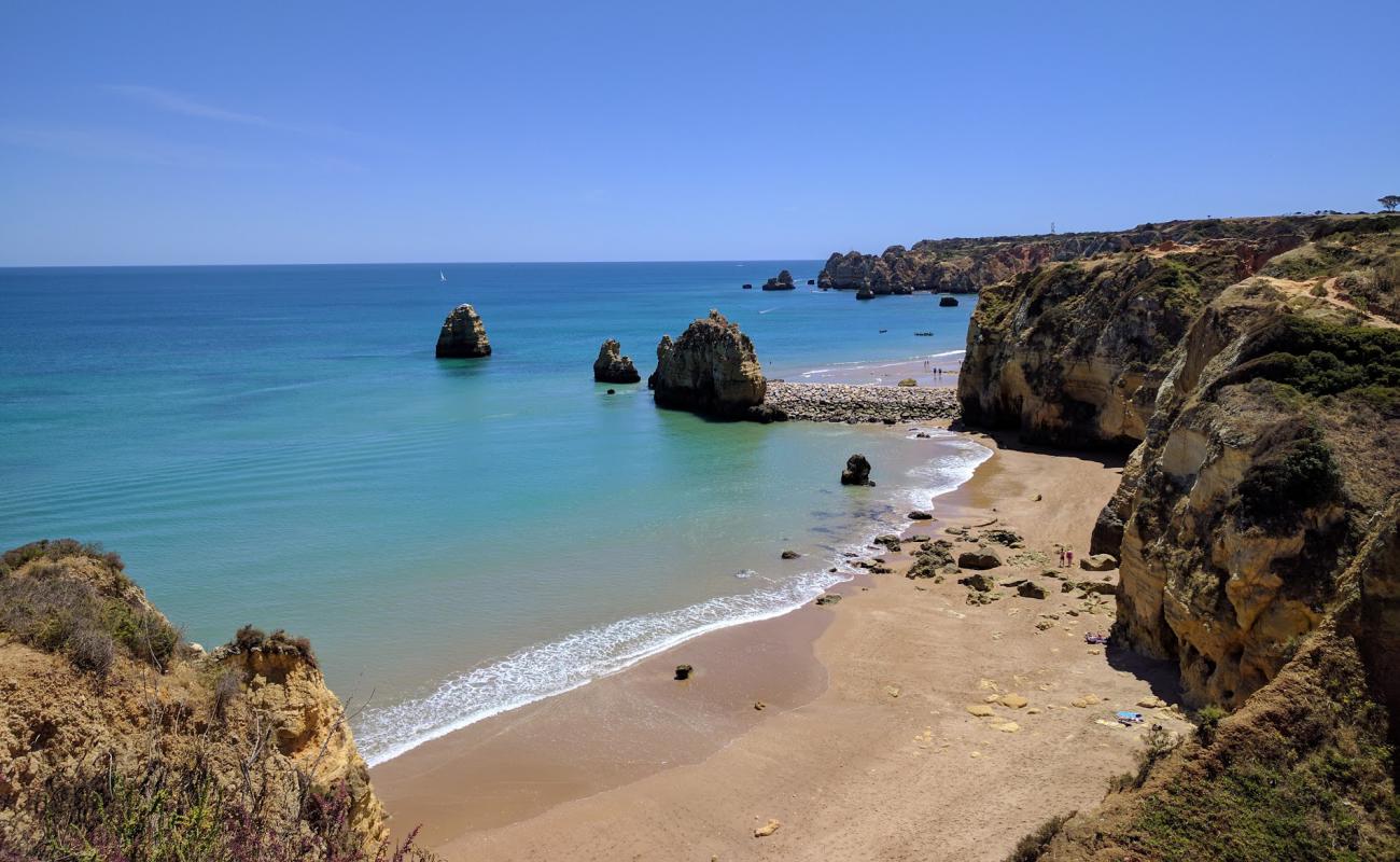 Photo of Praia do Pinhao with brown fine sand surface