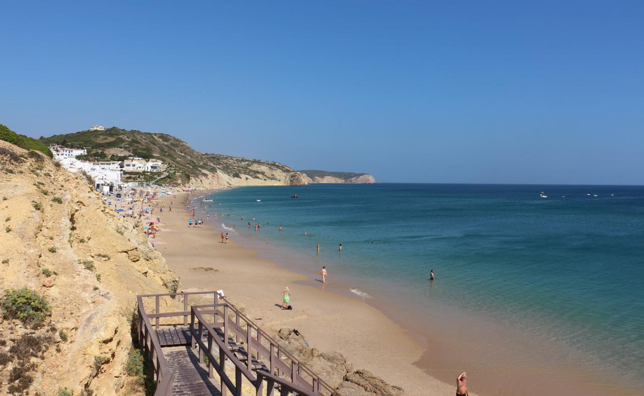 Photo of Praia da Salema with bright fine sand surface