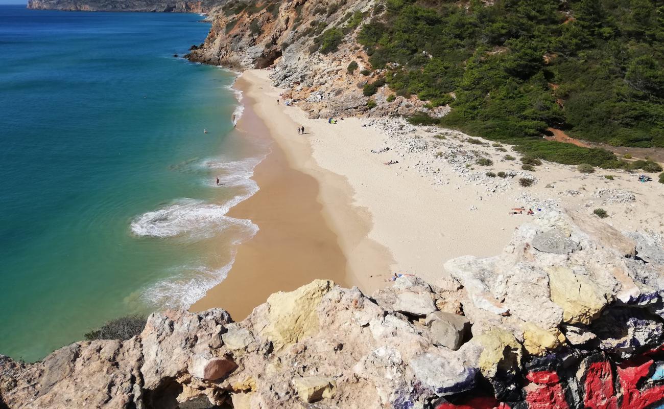 Photo of Praia da Figueira with bright fine sand surface