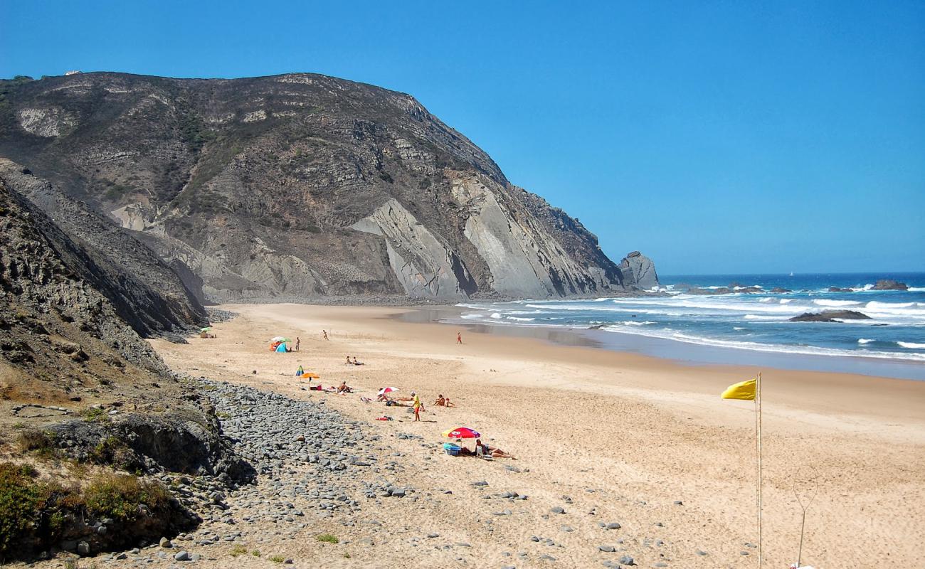 Photo of Praia do Castelejo with bright fine sand surface