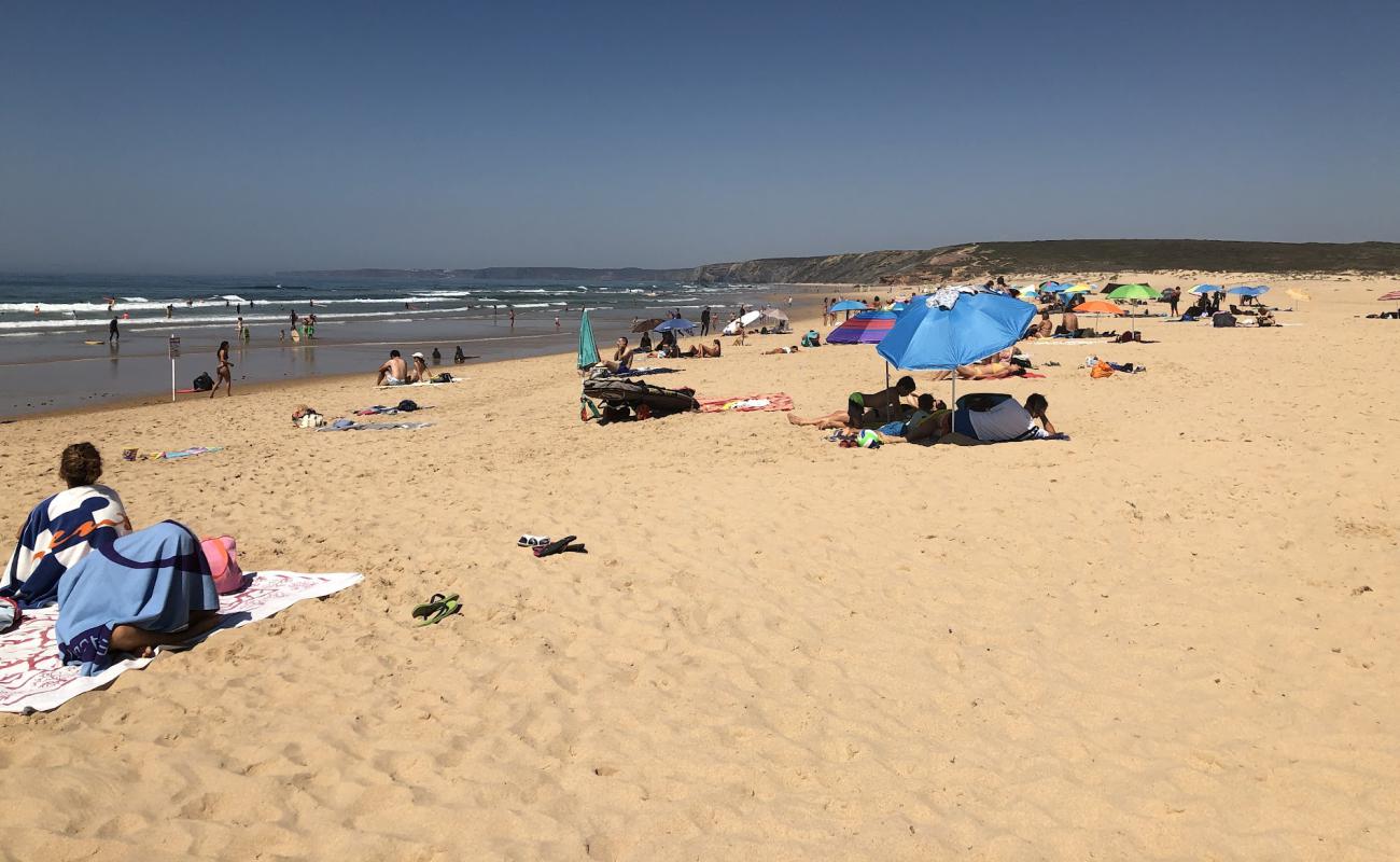 Photo of Praia da Bordeira with bright fine sand surface