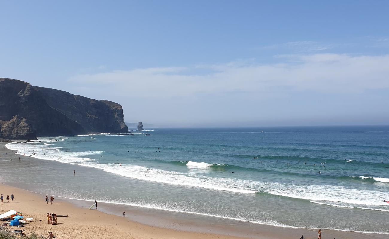 Photo of Praia da Arrifana with bright fine sand surface