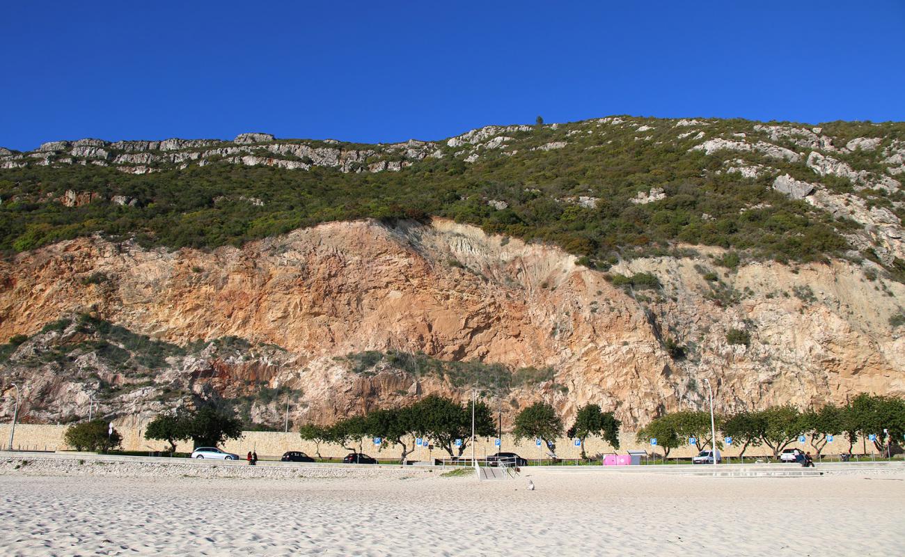 Photo of Praia da Figueirinha with white fine sand surface