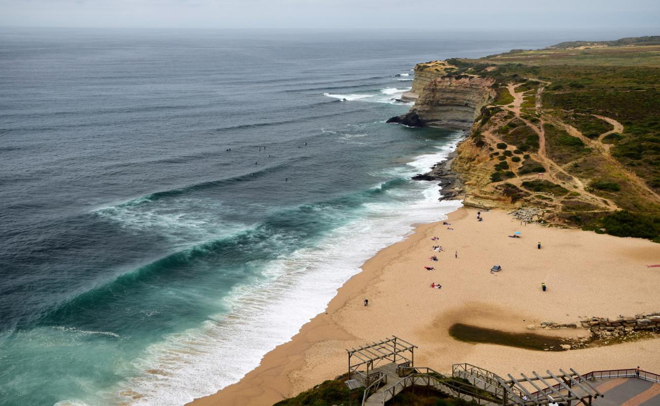 Photo of Praia do Alibaba with bright sand & rocks surface