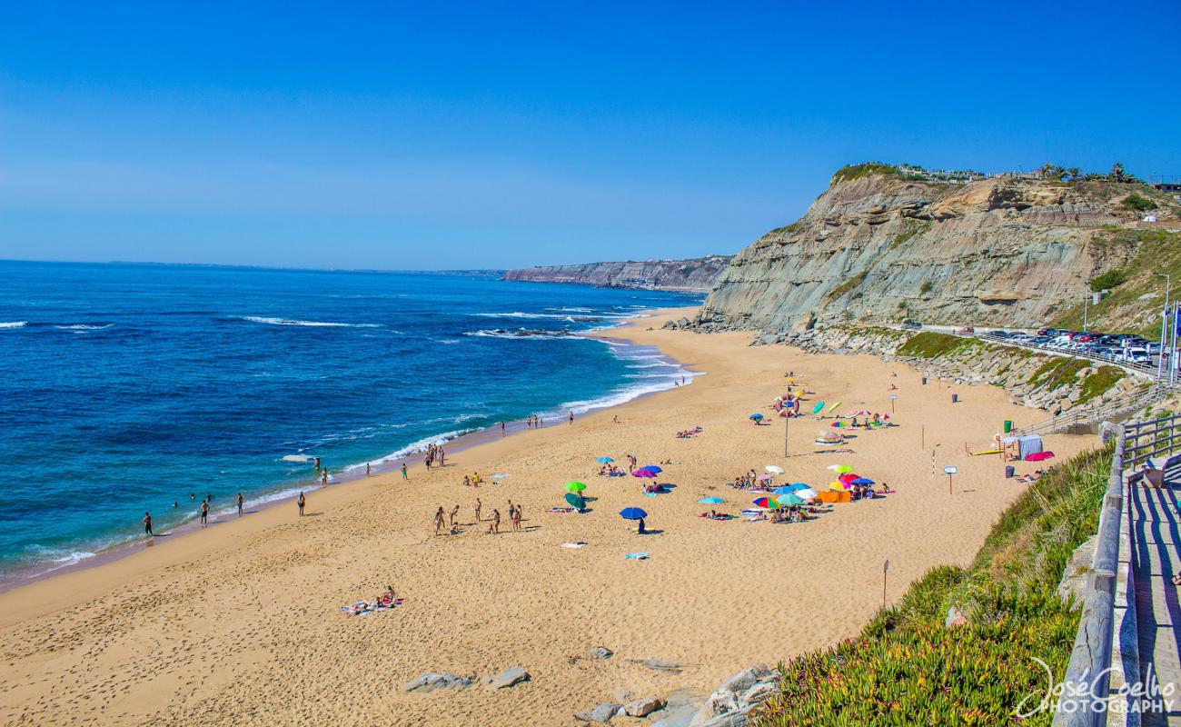 Photo of Praia de Porto Dinheiro with bright fine sand surface