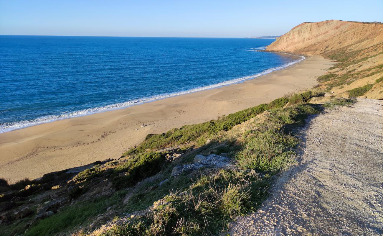 Photo of Praia da Gralha with bright sand surface