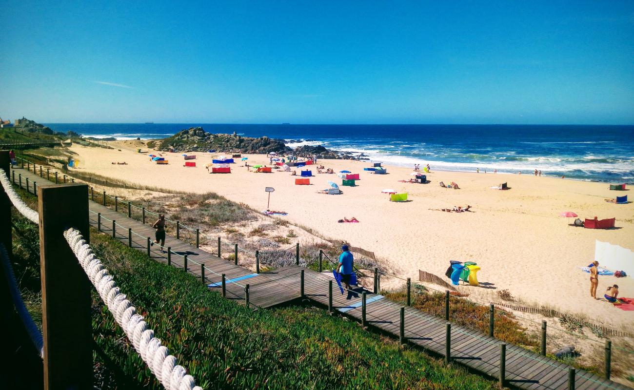 Photo of Praia do Aterro with bright fine sand surface