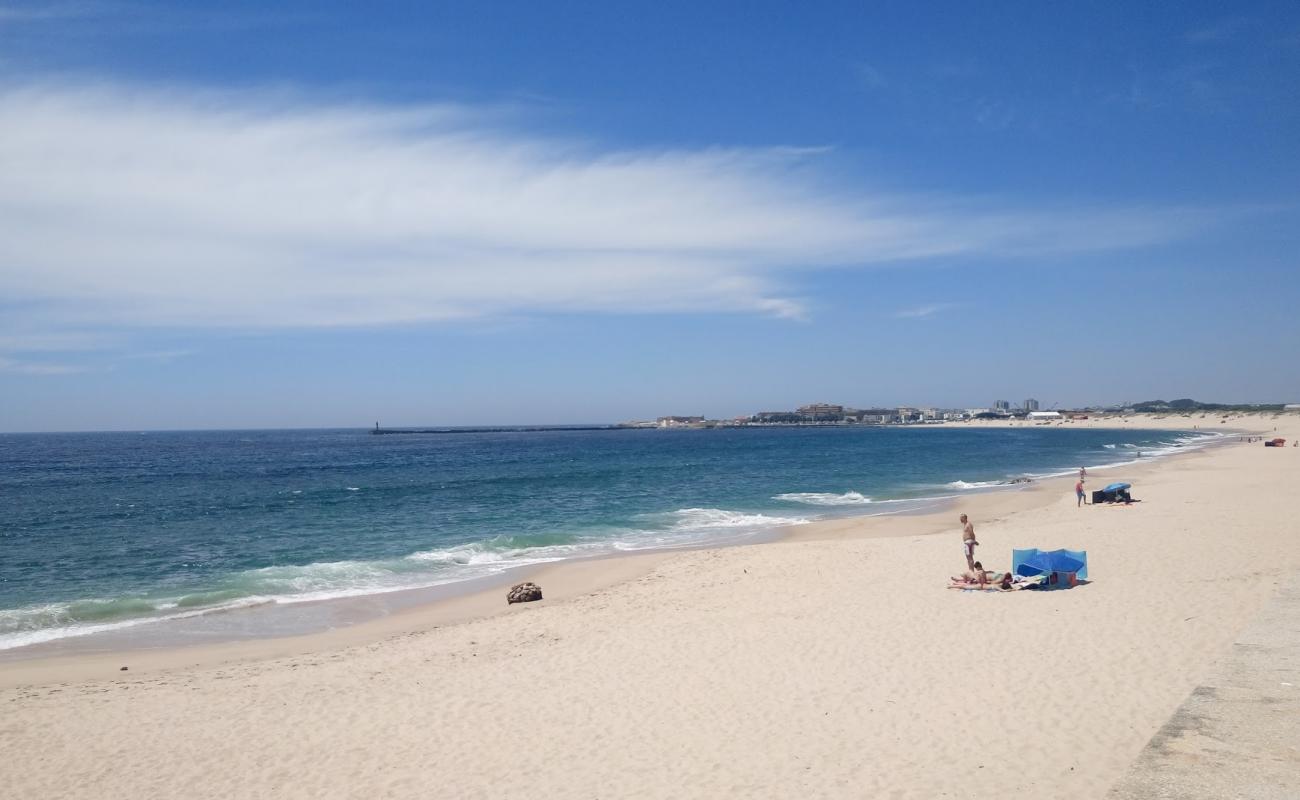 Photo of Praia de Arvore with bright fine sand surface