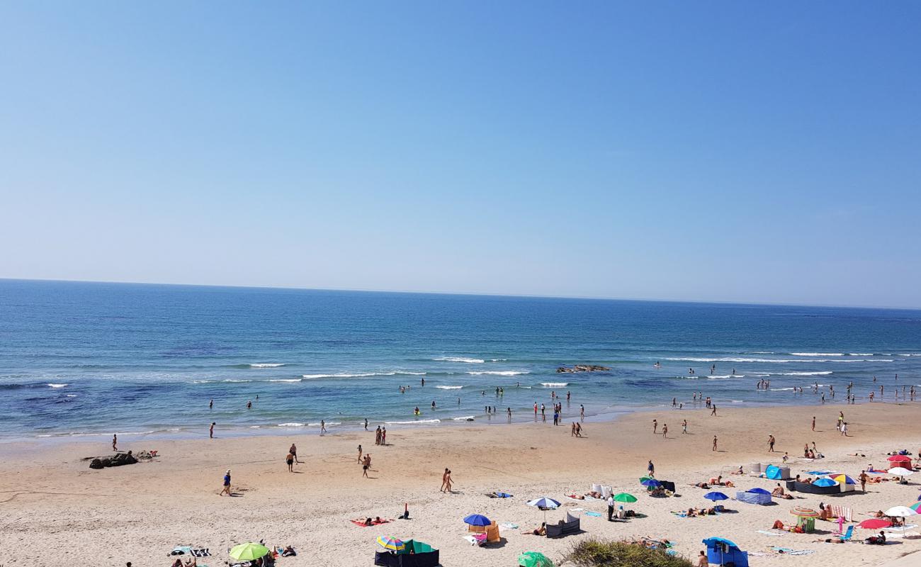 Photo of Praia da Apulia with bright fine sand surface