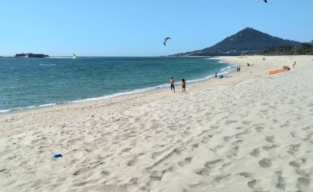 Photo of Praia de Moledo with white sand surface