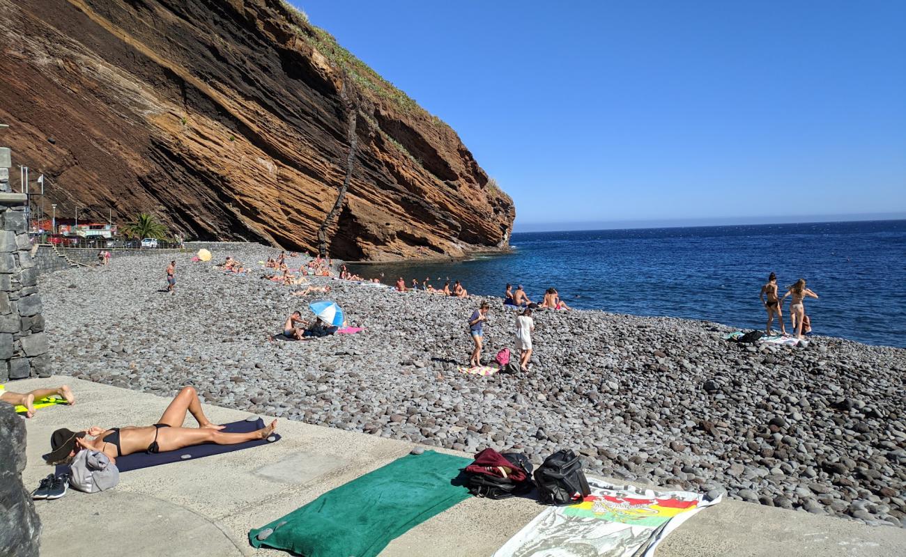 Photo of Praia do Garajau with gray pebble surface