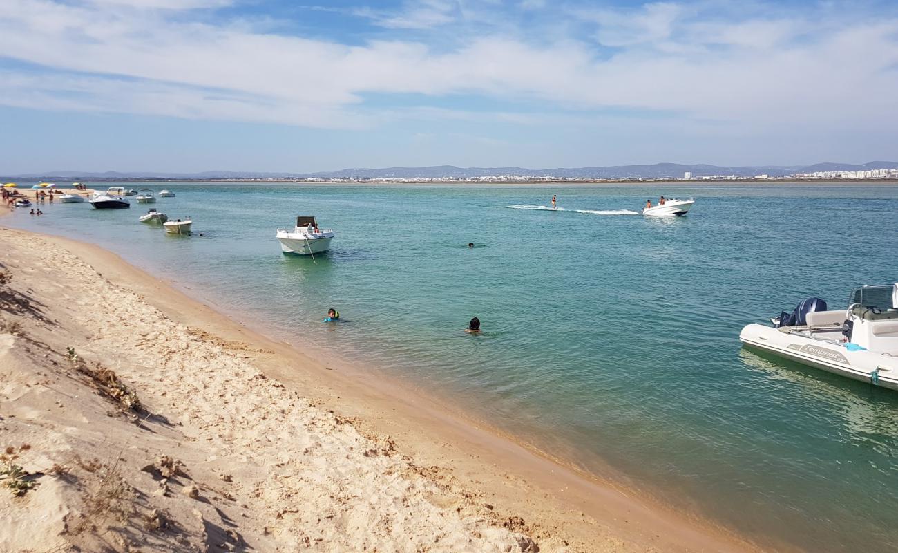 Photo of Praia da Barrinha with bright sand surface