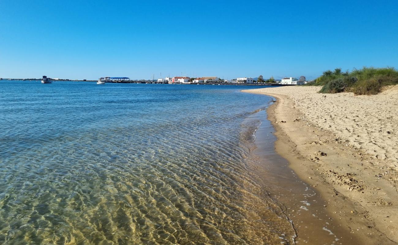 Photo of Praia dos Tesos with bright sand surface