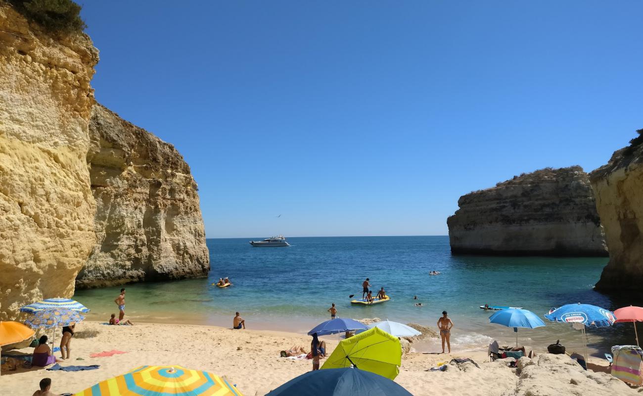 Photo of Praia do Barranquinho with bright sand surface