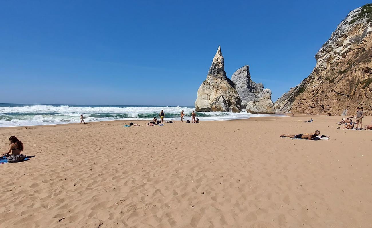 Photo of Praia da Aroeira with bright sand surface