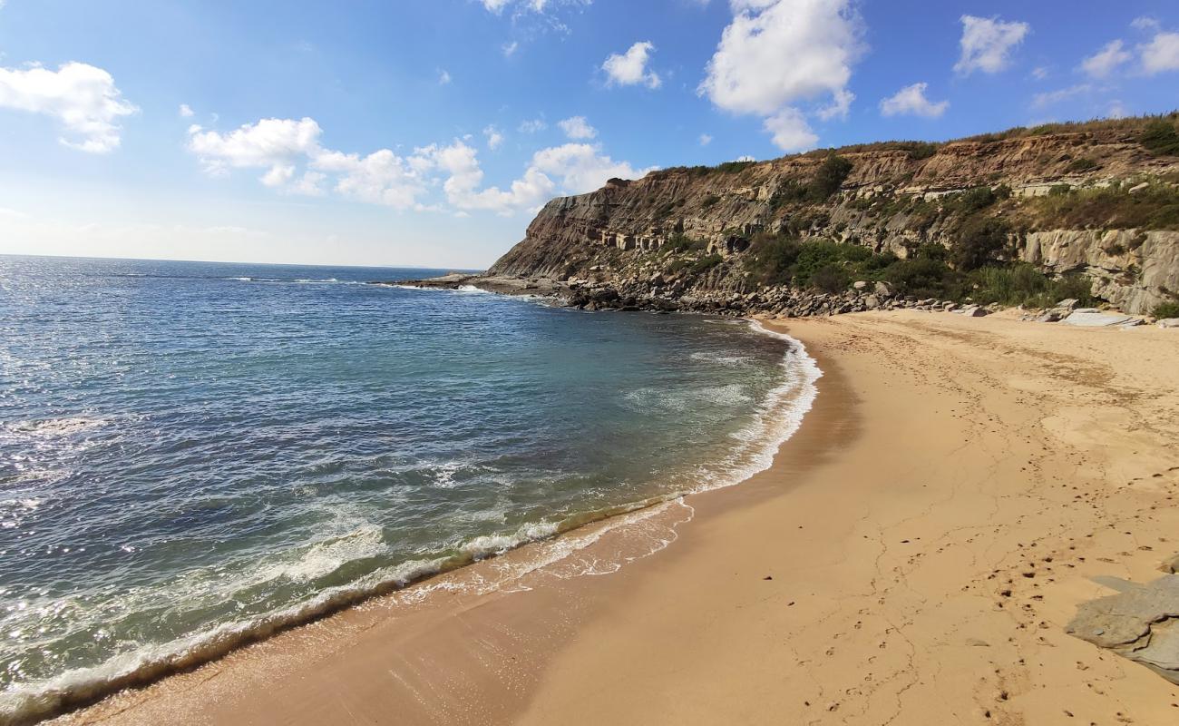 Photo of Praia de Vale Pombas with bright sand surface