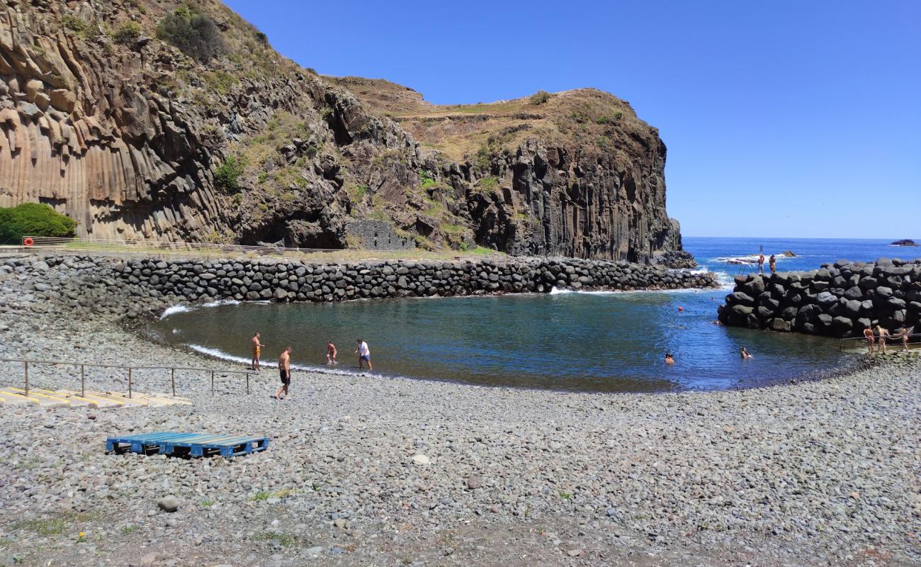 Photo of Complexo Balnear da Foz da Ribeira do Faial with gray pebble surface