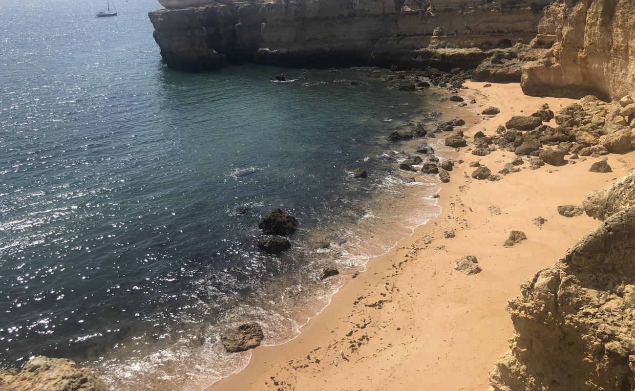 Photo of Praia da Ponta Pequena with bright sand surface