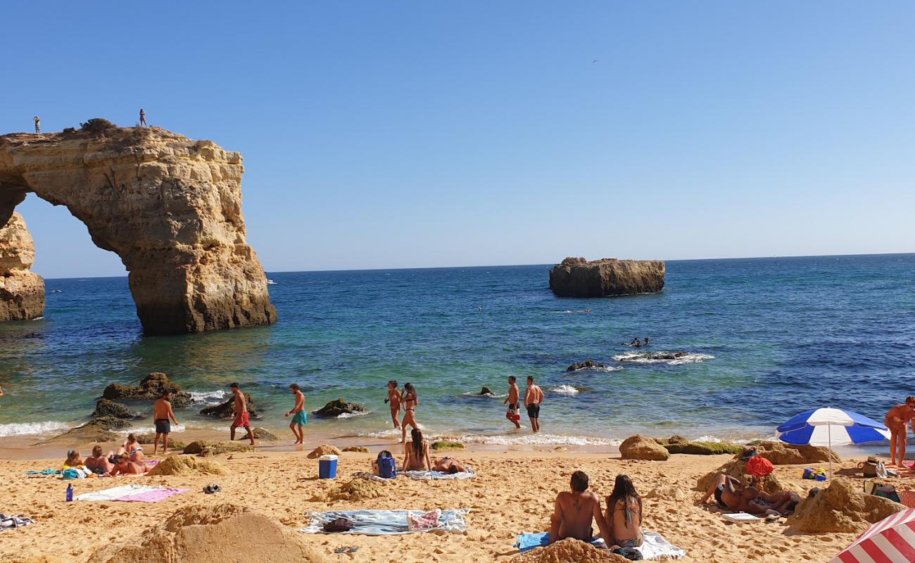 Photo of Praia da Estaquinha with bright sand surface