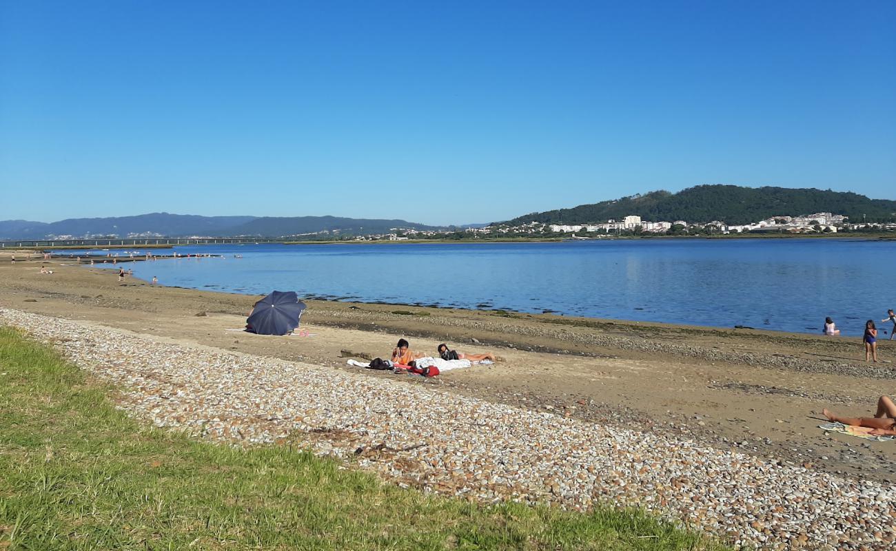 Photo of Praia Fluvial do Barracao dos Touros with bright sand surface