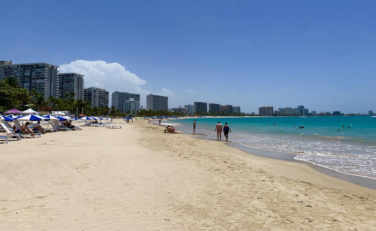 Photo of Isla Verde West with bright fine sand surface