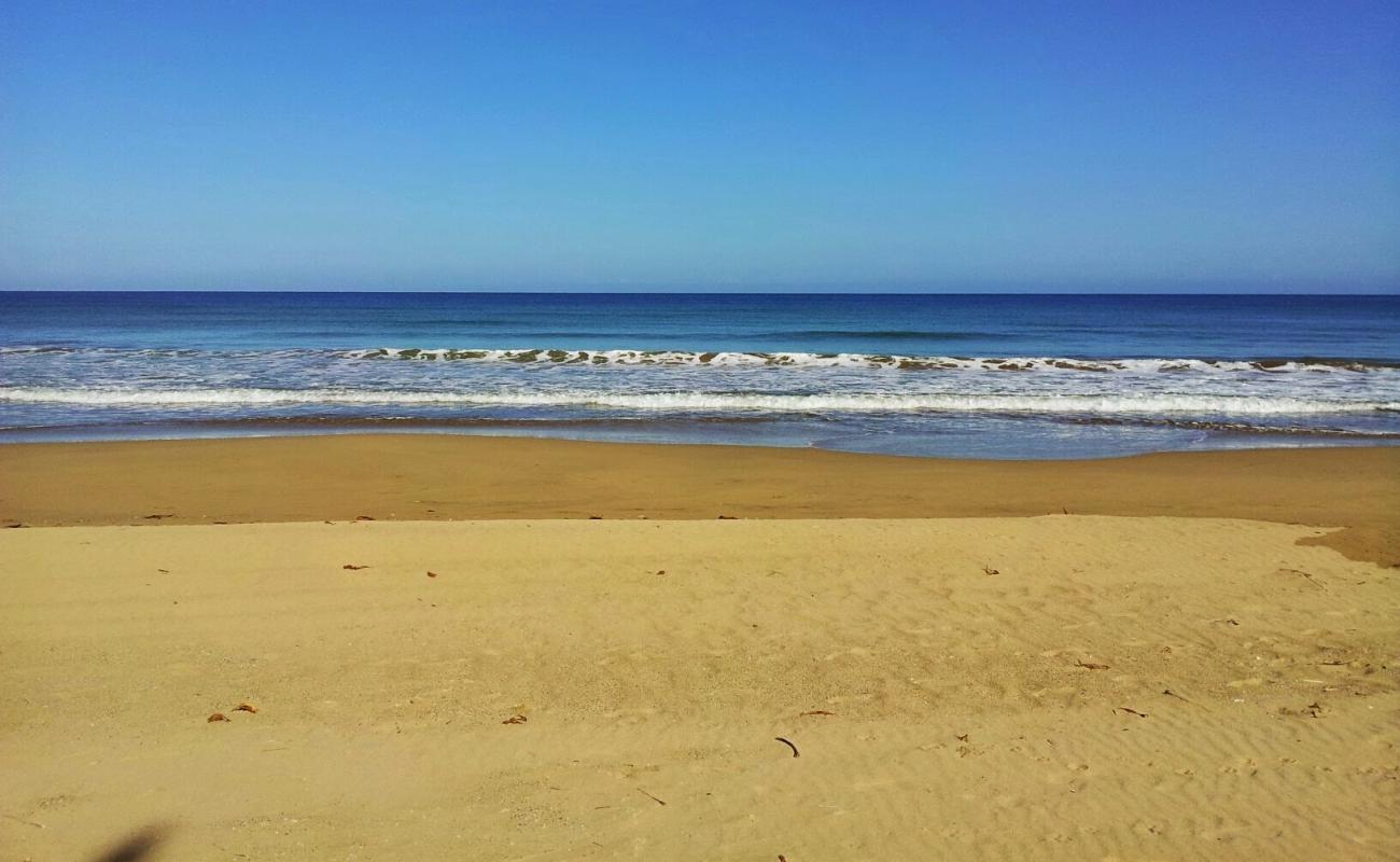 Photo of Playa Canones with gray sand surface