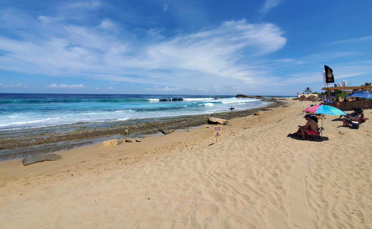 Photo of Middles beach with bright sand surface