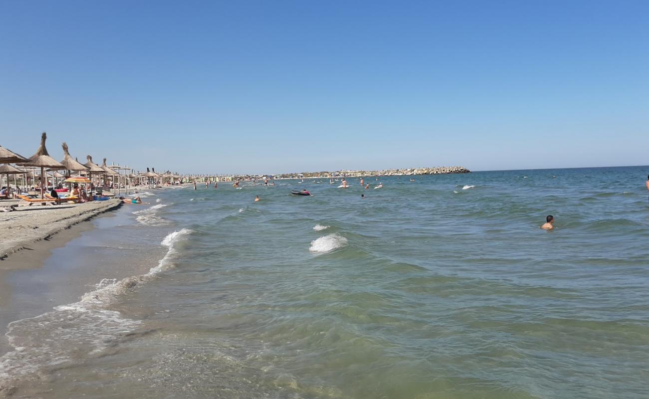 Photo of Nomad beach with bright sand surface