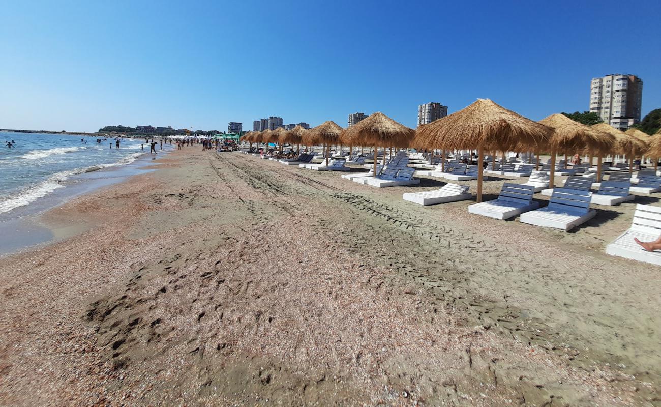 Photo of Mystic beach City with bright sand surface